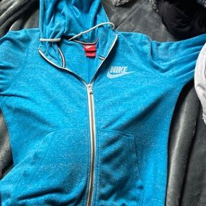 Woman’s Nike zip up bright blue size medium